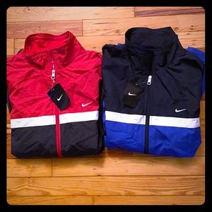 Two Nike windbreaker jackets
